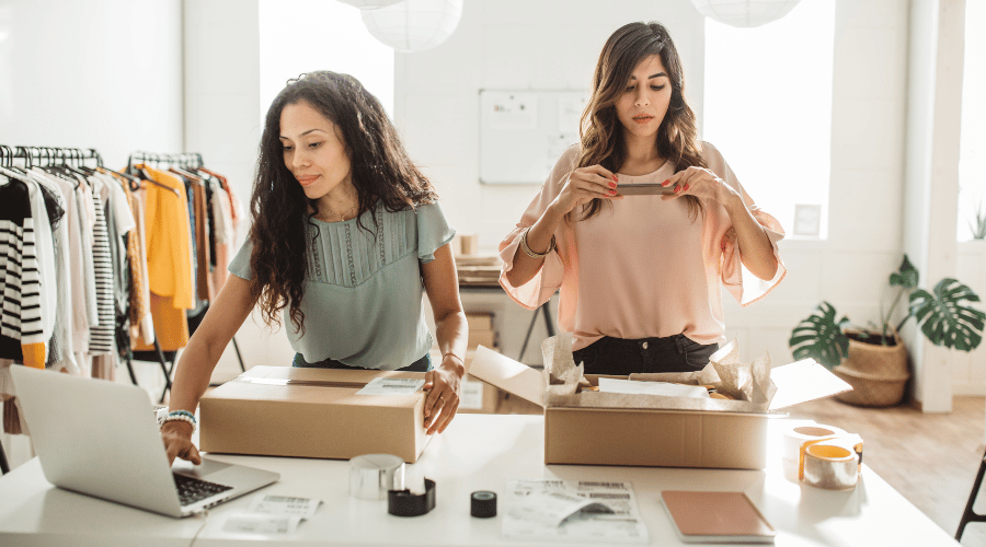 Small business owners checking their improved website performance